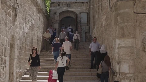 People going up and down on stairs near Church of the Holy Sepluchre Stock Footage 86038771