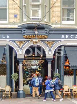 People going into the Castle Arcade in Cardiff, Wales Stock Photos