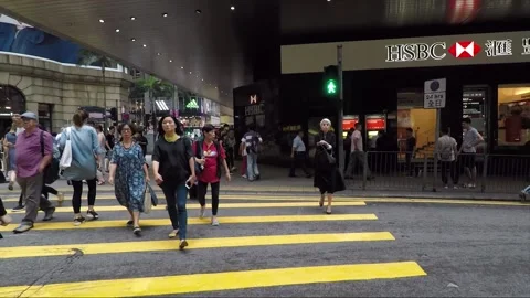People going on the crosswalk, camera move, Central, Hong Kong Stock Footage 143390867