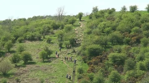 People Going Down A Hill (1) Stock Footage 11799205