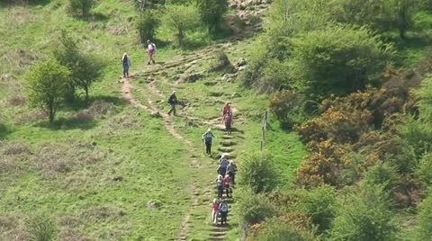 People Going Down A Hill (3) Stock Footage 11799218