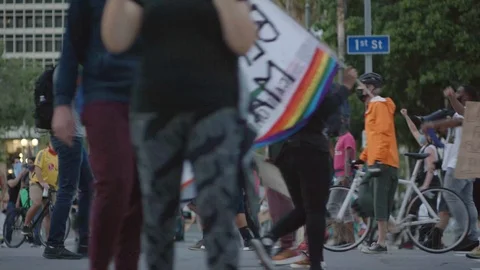 People going down the street in a protest, BLM, Downtown, LA, June 3 2020 Stock Footage 136749346