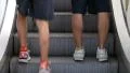 People going up on escalator stairway HD Footage