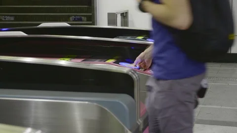 People Going Through Turnstile Video stock 98217555