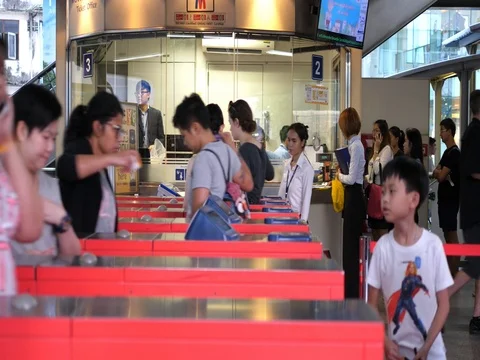 People Going Through Turnstile in Subway. Bangkok, BTS, 17 August, 2017. Video stock 80427454