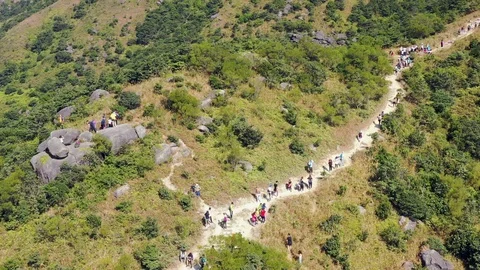 People going uphill to Sunset Peak, Lantau Island, Hong Kong, countryside Video stock 120715536