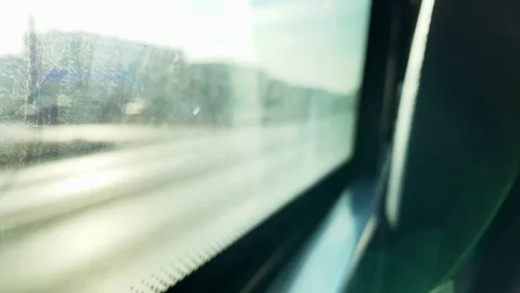 People going to work. They look out the window. Sunny day. Cars driving through  Stock Footage 143379950