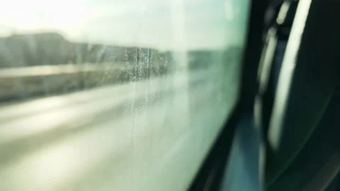 People going to work. They look out the window. Sunny day. Cars driving through  Stock Footage 143379961