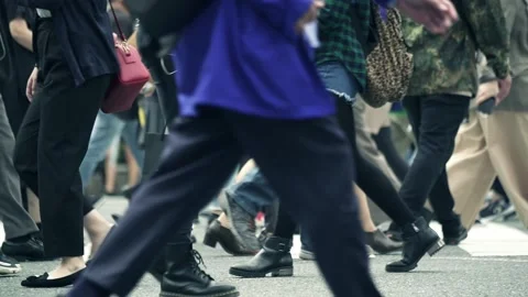 People going to work though busy Shibuya intersection Stock Footage 161857692