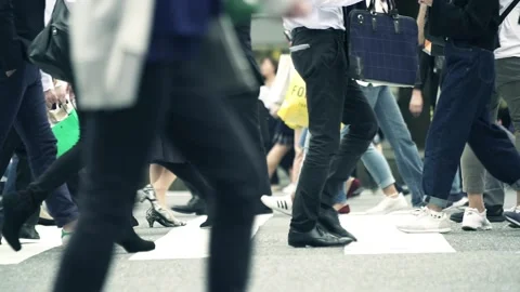 People going to work though busy Shibuya intersection Stock Footage 161857842