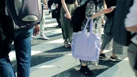 People going to work though busy Shibuya intersection Stock Footage 161863385