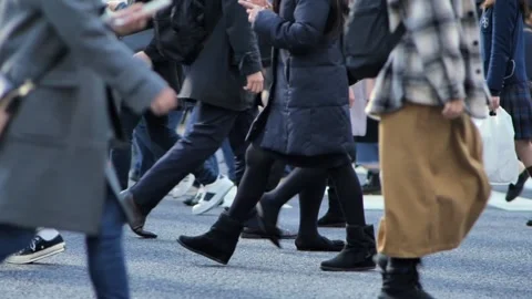 People going to work though busy Shibuya intersection Stock Footage 161866384