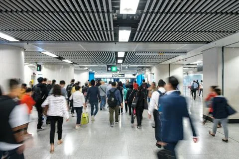 People going to work, walking inside MTR station / subway train station in Ho Stock Photos