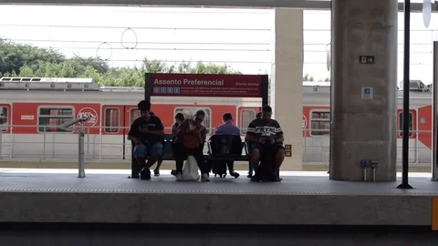 People of great age difference wait for the subway train Stock Footage 107094892
