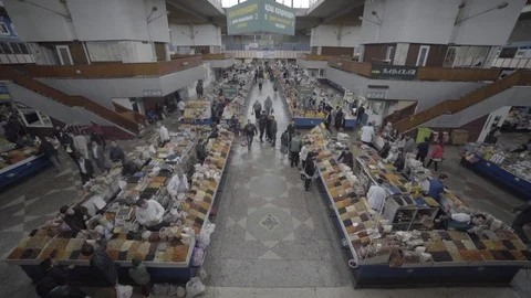 People in Green Bazaar market in Almaty, Kazakhstan Stock Footage