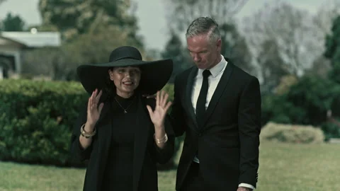 People grieving at a funeral Stock Footage 262299763