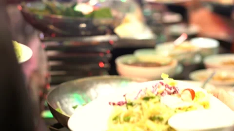 People group grab variety buffet food in hotel restaurant Stock Footage 149366179