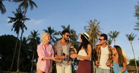 People Group Talking Communication Use Cell Smart Phones Outdoors At Sunset Stock Footage