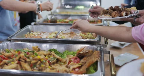 People hand grab buffet asain food in seminar hotel room Stock Footage 298475130