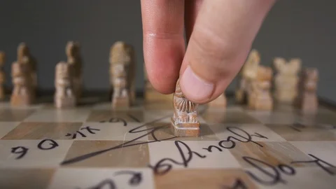 People hand move pawn at camera unusual chess close up in form of lion 4K. Stock Footage 119348118