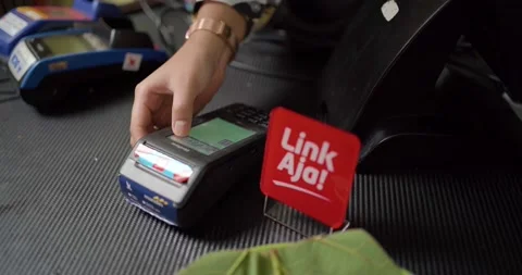 People hand press button to pay bill by password or pin code NFC Stock Footage 225393203
