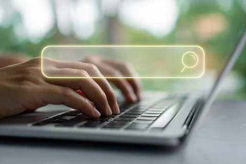 People hand using laptop or computor searching for information in internet .. Stock Photos
