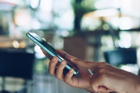 People hand using smartphone to do work business, social network, communica.. Stock Photos