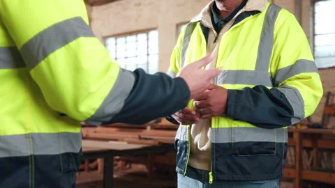 People, hands and discussion in workshop for carpentry, woodwork project or Stock Footage 341487014