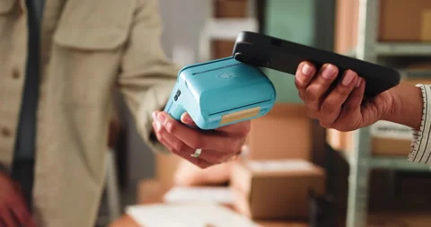 People, hands and pos machine with phone, box or delivery for payment, purchase Video stock 321050674