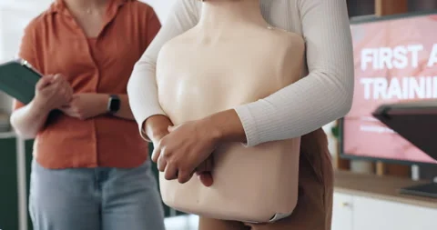 People, hands or dummy for CPR lesson for rescue safety, demonstration class or Stock Footage 306145131