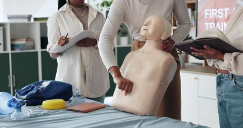 People, hands or dummy for first aid training for rescue safety, demonstration Stock Footage 306134383