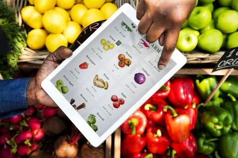 People Hands Picking Vegetable List From Tablet Stock Photos
