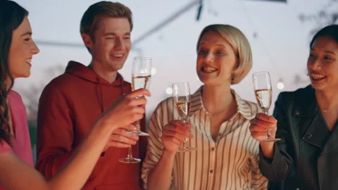People hands taking drinks at bar counter closeup. Friends making toast together Stock Footage 252000117
