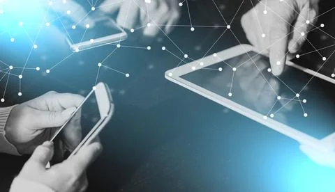 People hands using mobile phones and digital tablet; light effect 스톡 사진