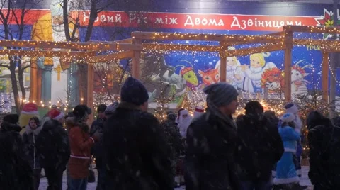 People Have a Fun New Year's Evening Kiev Sophia Square People in Red Santa Stock Footage 59131846