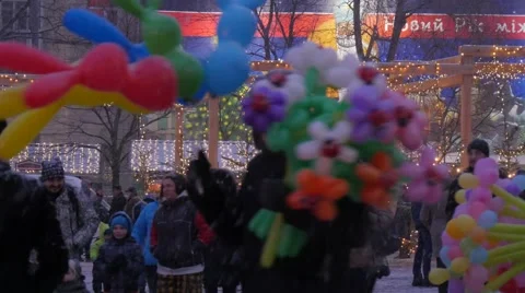People Have a Fun Selling Balloons New Year Kiev Sophia Square People in Red Stock Footage 59131925