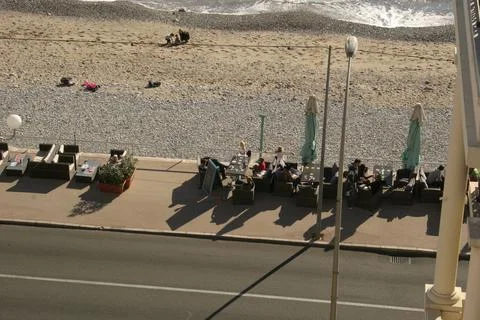People having breakfast on esplanade Stock Photos