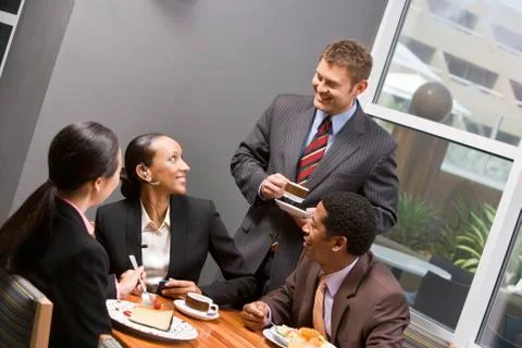 People Having Discussion During Their Break Stock Photos
