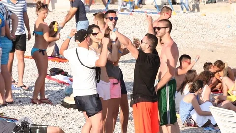 People having fun at the beach Stock Footage 73021729