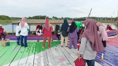 People having fun driving and discovering places with a traditional boat. Video stock 223441272