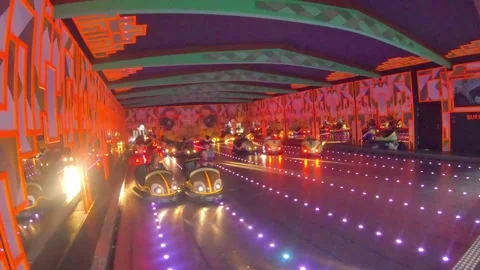 People having fun on Electric bumper cars  in Tivoli Copenhagen Denmark Video stock 132643612