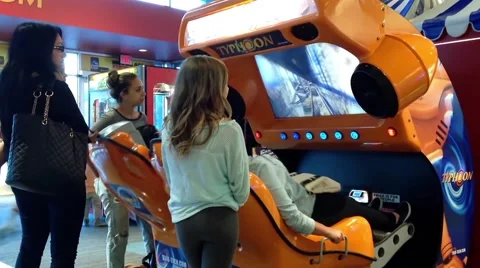 People having fun inside cinema game center Stock Footage 51425213