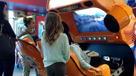 People having fun inside cinema game center Video stock 51425888