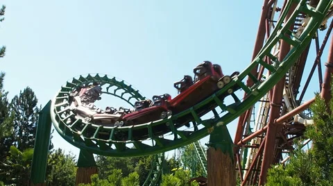 People having fun looping at roller coaster called magic mountain 스톡 동영상 66692579