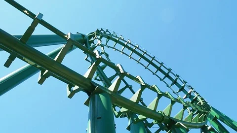 People having fun looping at roller coaster called magic mountain Video stock 70611401