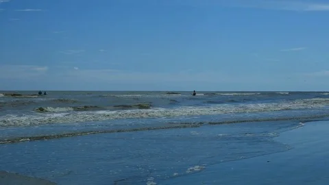 People having fun in the ocean Stock Footage 77552717