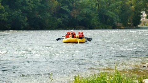 People having fun or doing sport on rubber on the river rafting Stock Footage 112260088