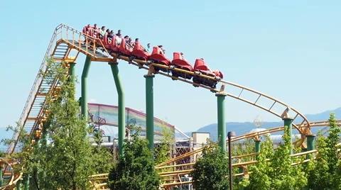 People having fun at roller coaster 스톡 동영상 64932031