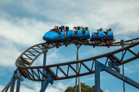 People having fun on a roller coaster Stock Photos