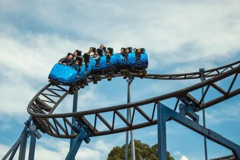 People having fun on a roller coaster Stock Photos